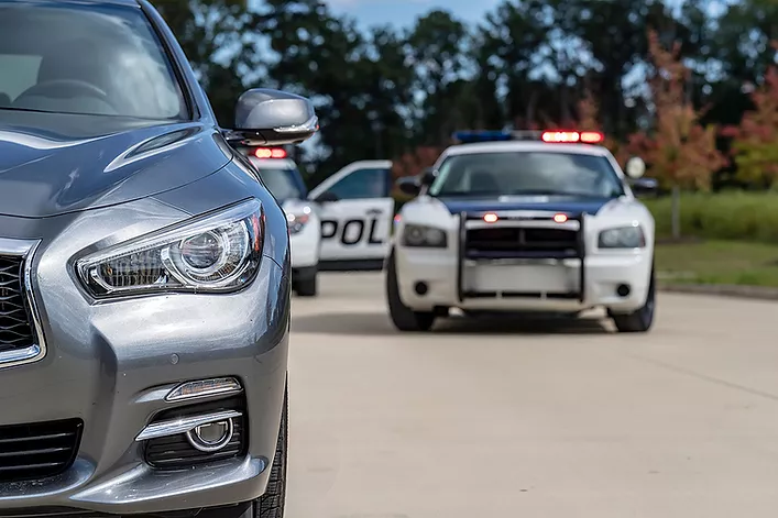 Image of car being pulled over for DUI