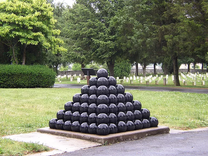 Cemetery with image of stacked cannonballs