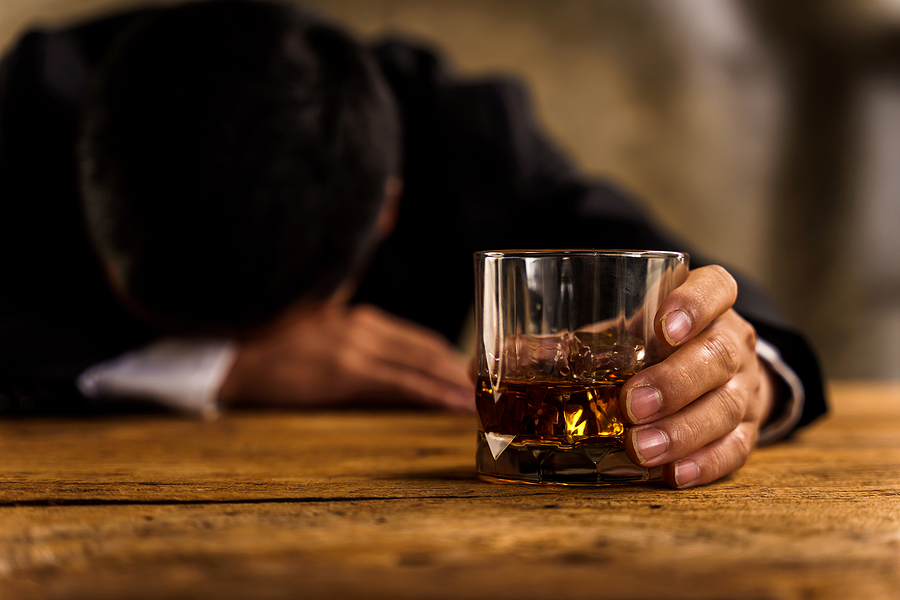 Alcoholism, Depressed Asian Young Man Sleep On Table While Drinking